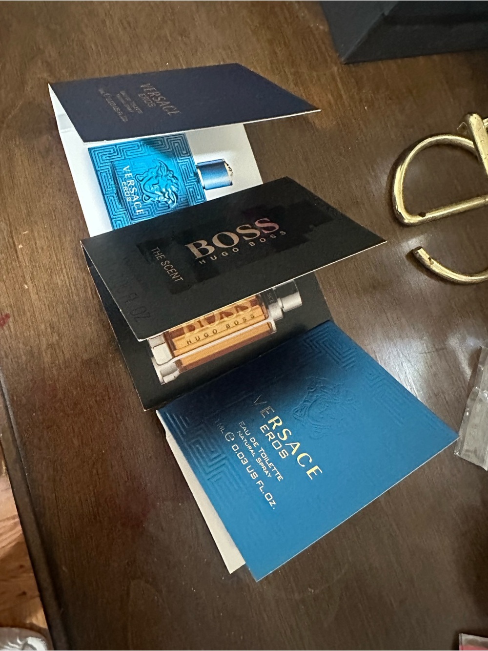 Fragrance sample cards on table